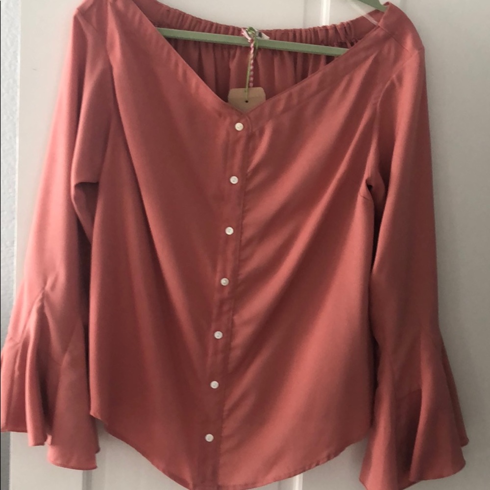 Pretty in Peach Blouse with flaired sleeves.